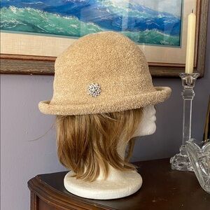 Tan color bucket style hat in good condition